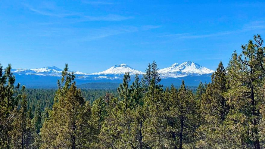 Sweeping and stunning Cascade Mountain views from this great condition ''retro'' cabin with a lot of style. Excellent privacy on small acreage. Interior Features: Large windows take advantage of the BIG view; Open living floor plan; High Vaulted ceiling, open stair railing; Wood beams, wood clad ceilings and walls; Rock fireplace (new firebox); Large skylight provides good natural light; Separation between upstairs primary bedroom and other 2 downstairs bedrooms; Walk out deck from primary bedroom; Fun loft and crows nest with ladder. Exterior Features: Large wrap around deck that takes advantage of view; Metal Roof; Fresh paint on exterior and deck; Newer hot water heater; Numerous ways to make further use of the property. Quiet neighborhood, close to hiking trails and paved biking roads nearby. Very low HOA fees with a community water system. Short term rentals allowed in the neighborhood.