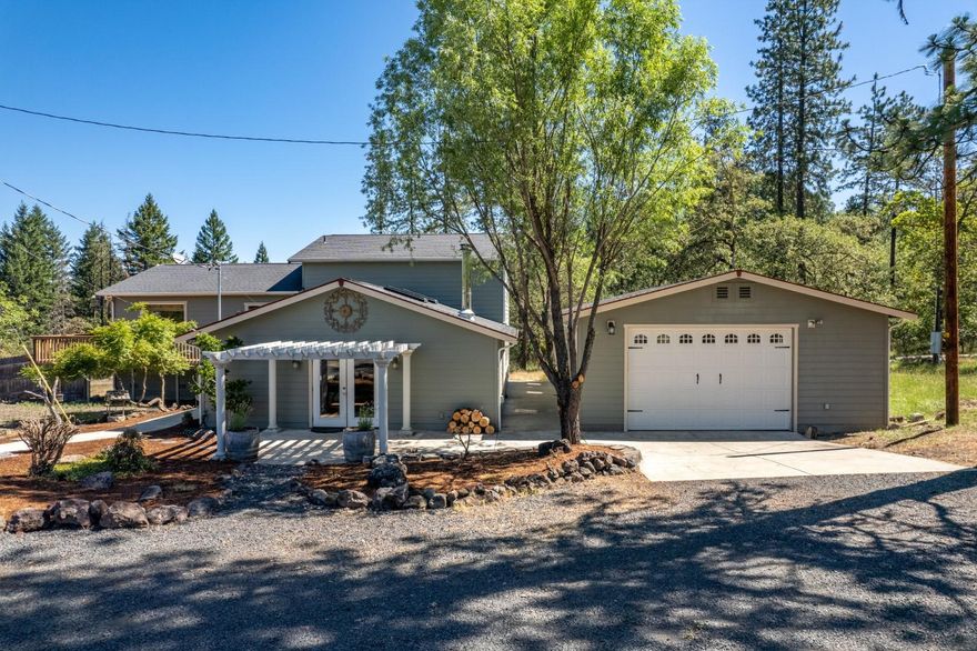 Beautiful custom built 1-owner home with huge, detached shop on 5.5 acres of useable land, and minutes to Medford. Looking for an extremely peaceful, rural setting with a newer custom built home & shop? Look no further. Enter through private gate into your own sanctuary. Wildlife galore, boarders BLM land, perfect for hiking, biking, riding quads, or anything you can dream of! Huge wrap around wood deck to take in the amazing views. Granite countertops, slate flooring, Oak hardwood flooring, custom cabinets w/glass doors, built-ins, sky lighting in kitchen & family room, +more. Excellent well 9 GPM (per owner). Wonderful open floor plan w/huge picture windows, certified wood stove, forced heating/air, custom bar, pool table, +more. The primary suite offers walk-in closet, oversized tub, tiled flooring & walk-in shower. Det shop is insulated w/2 rooms, full bath, + additional storage. Partially fenced area perfect for gardening, mature trees & landscaping. Exceptional opportunity!