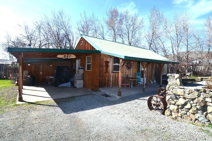 .54 Acre lot in Mount Vernon, Oregon with a 1930's home. 1,192 sq ft with 2 bedrooms, 1.5 baths, oil monitor stove, mainly upgraded windows to vinyl and metal roof. Gorgeous wood cabinets pop in the kitchen and there is plenty of counter space. Outside you have a green house, raised garden beds, stone bbq/patio, vine covered gazebo, barn and nice covered patio off the front of the home. Attached shed with concrete floor. A lot of fruit trees, rhubarb, blueberries, strawberry patch and so much more to water with your water rights from Beech creek. Multiple off street parking spots, RV parking and covered parking.