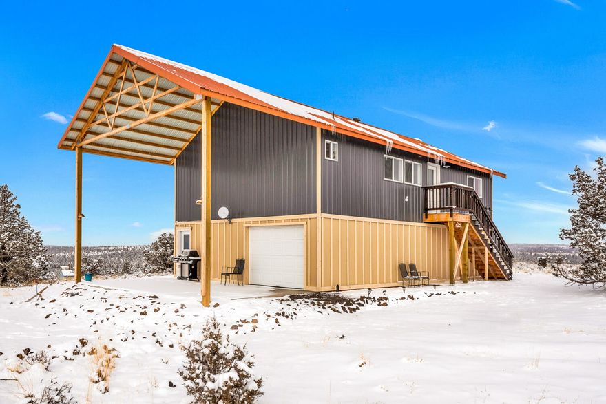 Located at the end of the road and the top of the hill sits 19.48 buildable acres in Ironwood Estates. Surrounded by high end homes with Cascade Mountain & 360 degree valley views enjoy the best sunsets and sunrises.  Live in the charming and well thought out 1 bedroom residence located on the 2nd level of the shop while building your dream home!  Interior of residence features custom barn doors, tongue and groove ceilings, large tiled shower with rain head, butcher block counters and pantry. Property features a cleared homesite with septic, water, and power in place. Large 1,120 square foot shop boasts 400  amp service, 12' x 14' doors and two 7'x10' doors with the ability to pull through to a 392 sq. foot covered patio. The property is fully fenced and gated, with a quarter-mile driveway curving up around the hill. This is one you will want to view! See attached 3-D virtual tour