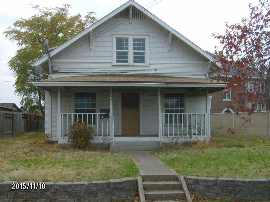 Duplex consists of a two bedroom, one bath unit and a one bedroom, one bath unit. Both units have spacious living areas. The home is a fixer and has fire damage. It will not finance. Owner may carry. Price with owner carry is $93,250. All information is deemed reliable, but not verified or guaranteed. All buyers to perform their own due diligence with regard to the possible uses and condition of the property. Listing agent is related to selling company's manager.