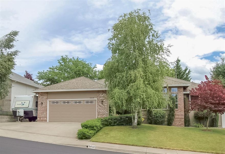 Beautifully maintained home in desirable Eagle Trace Subdivision. This home is light and bright with a great flow for entertaining. You're greeted with hardwood floors in the formal entry and tall ceilings throughout. Enjoy both formal and informal dining areas and a spacious family room with a gas fireplace, coffered ceiling and lots of windows for natural light. The kitchen has beautiful hardwood floors, lots of counter space and tons of storage. Many of the cabinets feature pull-outs and there's also a handy built-in desk. The Master bedroom has a vaulted ceiling and plant shelf and a slider out to the patio area. The master bath has two large closets with mirrored doors and a separate room with the shower and toilet. The backyard is simply paradise. Enjoy the gigantic deck, spacious lawn, garden area, and gorgeous plants that have been beautifully maintained. There is RV parking, a shed and dog kennel. It's also wired for a hot tub. Don't miss this one!! Home is immaculate.