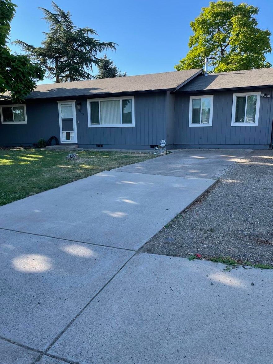 Don't wait to view this lovely home with lots of updating. The new laminate flooring is beautiful as you enter the home. The spacious living room adjoins the dining area and gives you that open feel. The kitchen has beautiful new quartz counter tops & freshly painted cabinets plus a brand new stainless steel range/oven. The bedrooms are all spacious.  The primary bedroom, the garage conversion, is featured with a custom closet with lots of cabinets and drawer space plus a handy shoe rack. Convenient laundry space just off the primary bedroom. The main bathroom with have new flooring installed and new trim work around new doors in the hall by close of escrow.