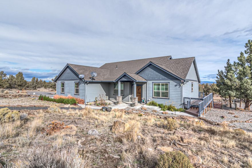 18+ acres borders BLM & convenient location in desirable Powell Butte, beautiful 2015 single level home with huge shop!  Home is 2018 sq. ft. 3 bedrooms, 2 baths with primary bedroom separation and office off main entrance.  Great room has 9' walls, vaulted ceilings, gas fireplace and awesome north & east views. Spacious kitchen great for entertaining with double oven, pantry and 4x10 island with eating bar and French doors off dining room to partially covered deck.  Primary vaulted suite has large bath, double sinks, tiled shower & walk in closet. Private well, low maintenance landscaping, fire pit, fenced yard with turf, motocross track, borders BLM on 2 sides with no neighbors.  Huge 44x72 insulated shop, concrete floor, 5 - 14' doors(can drive through 2 bays), 1 - 8' door, 220 electric at shop & frost free faucet to outside of shop.  Bring the toys & animals, don't miss out on this home call today!