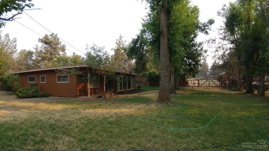 Here is a fantastic opportunity to have a 5.05 acre home in the country only minutes to downtown Redmond. This property is located in a rural area away from the noise and hustle of the city and offers a home with endless possibilities. This existing 3 bedroom 1.5 bath home needs a little TLC. Property is fenced and cross fenced, there is 3.18 acres of irrigation, several outbuildings, several fruit trees and one nut tree. Property is in the Redmond Urban Growth Reserve area.