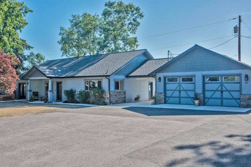 Located in an area of beautiful homes w/nice views of mountains, trees & fields. Built in 2015 w/vaulted ceilings in great room, dining room. Kitchen with granite counters, nicely upgraded appliances, coffee bar, great cabinets w/ soft close drawers, tile floors & lg. windows. Nice Mater suite w/sliding barn door leading to the master bath; dbl sinks, lg tile shower & floor & lg walk-in closet. Door to patio off of master leads to a hot tub. The two good sized bedrooms have walk-in closets. Nice tile & granite in main bath. Covered breezeway w/ a lg two car garage/shop area, finished & insulated + separate studio/workshop area. This property has it all!