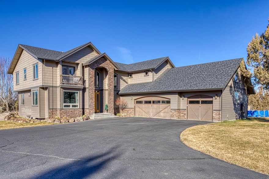 Unique opportunity to own a Stunning over 4000 sq ft home on 10 acres w/ Panoramic Cascade Views. Low cost flood irrigation on 5.5 acres, fenced & ready for your vision of horses or a farm! Home sits 400 yards off road down a private driveway & has that Country feel, but 1 mile from town!  Main level Bed/Bath w/ private patio & Office with hardwood floors. Every bedroom has a private balcony with views! Gardeners dream w/ sbeautifully landscaped yard, flowers & pond w/ water feature. Amazing outdoor living w/ 2000 sf patio w/ Hot tub.  Gourmet Updated kitchen, 2 fireplaces, New Hardwood floors & carpet, XL Master bedroom w/ huge walk in closet. Master bath has private balcony & huge tub. 2 Laundry rooms. 8' Fir doors, High ceilings.  Room for Toys, Storage/ Equipment in the 3 car attached garage, 42x80 finished Pole barn shop. Convert the shop to 7 horse stalls & hay storage, or for your Car collection! Investors? Would make a great short term rental for LG families, reunions, weddings