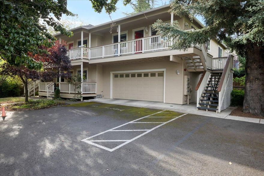 Fantastic opportunity to enjoy the Ashland lifestyle at an affordable price! This quiet corner-unit townhome is just minutes from SOU, parks, and scenic hiking trails. The spacious layout is filled with natural light and features 2 bedrooms, including a primary suite with its own bathroom, plus an additional full bath. Convenient garage parking, an extra outdoor parking spot, and a large secure storage unit make day to day living easy. HOA dues cover water, sewer, trash, recycling, and landscaping, giving you low maintenance peace of mind.