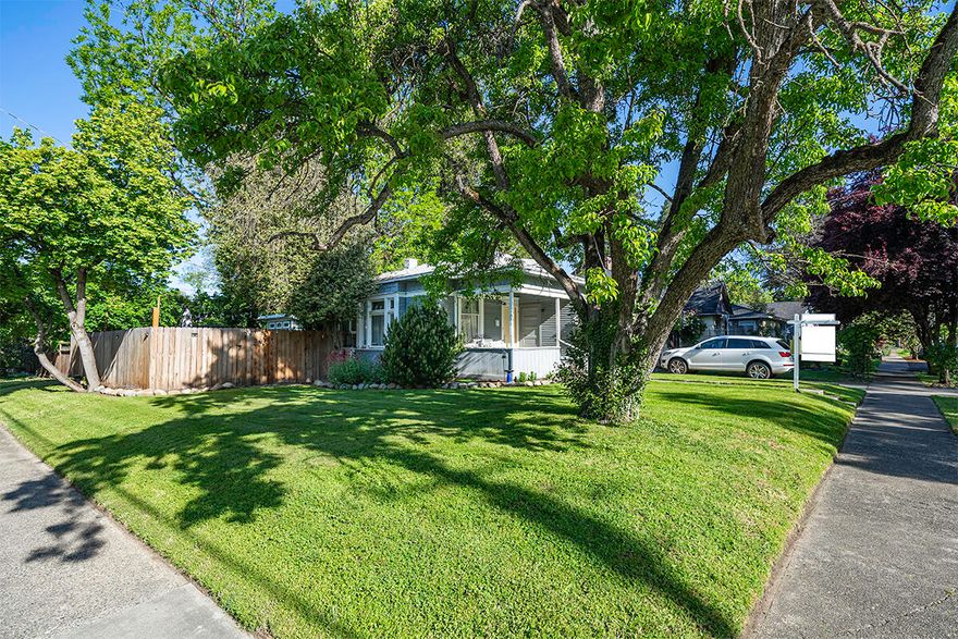 **Charming 1910 Cottage in Old East Medford - Modern Updates with Art Studio & Large Lot** Welcome to the perfect blend of historic charm and modern convenience in this tastefully updated 1910 cottage in old East Medford. This unique property offers a comfortable retreat with a spacious bedroom complete with built-in closet as well as a small sitting room, nursery, or additional closet space. Once inside, you'll find a peaceful & inviting interior that tastefully integrates modern updates with original features. The living area combines comfort and style, perfect for both relaxing and entertaining. Situated on a generously sized lot, this property provides ample space for gardening, outdoor activities, RV parking, and has an adorable Art Studio that can serve as a workshop, home office, or oversized shed. Enjoy the beautiful outdoor seating area, complete with a fire pit. This tranquil setting is great for gatherings, star-gazing, or simply enjoying quiet moments.