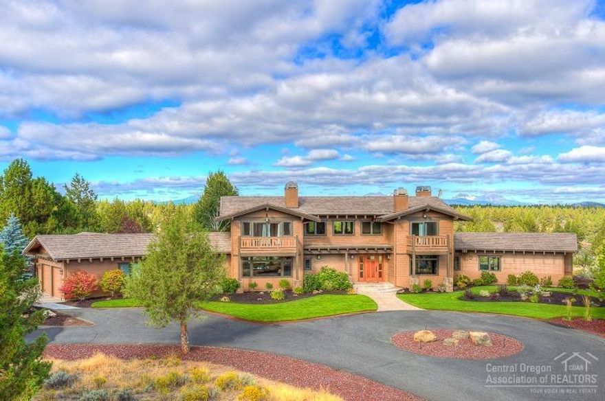 Elegant home with Cascade views. Extensively remodeled inside & out including landscaping/lawn in 2013/2014. Features incl 4 en suites, granite & marble counter tops, comm grade stove, rec rm, lg. gas & wood fireplaces, custom front door, integrated entertainment system, 2 laundry rooms, new paved driveway & HVAC & water filter systems. Surrounded on 3 sides by deeded open space w/ barn/guest house, storage barns, sport court & rec area w/pond/beach, gazebo, fire pit & grass for family gatherings.