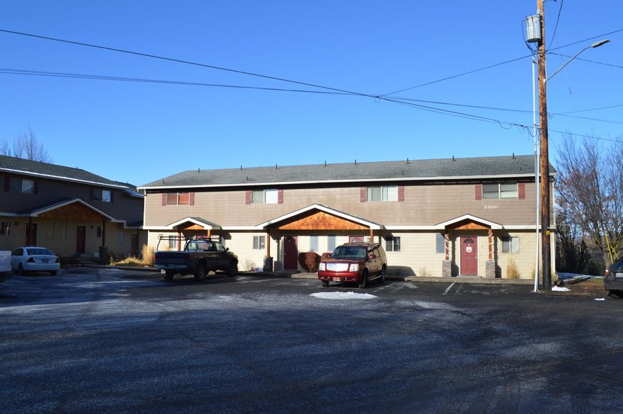 Nicely updated siding, windows and front entries at the end.  Close to Sky Lakes. 3 separate Buildings. 12 units. Built in 1975. Tenants have 2 parking spaces. Electric cadet heaters.  Each unit comes with refrigerator, range, dishwasher and disposal. Overlooks Harbor Isles.  More expensive units have large decks. Updated in 1995. Rent total $8700.00 per month. 3 bed 1.5 baths> Each unit 1240-1250 sq feet each.