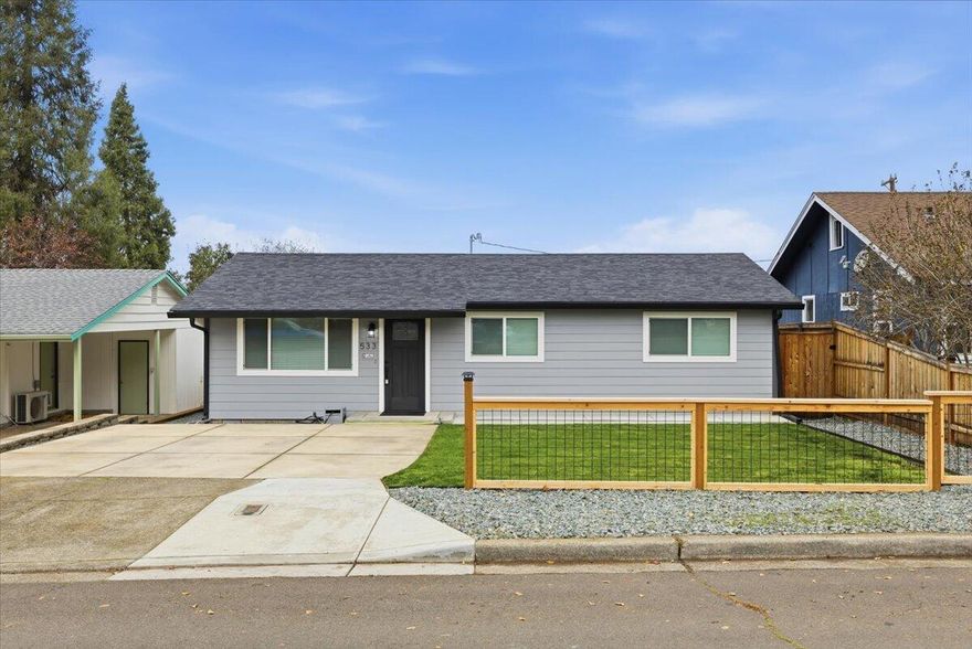Adorable Turn-Key Home in the Heart of Medford! Just a short walk from both the elementary and middle school, this beautifully updated home blends charm and practicality. Enjoy upgraded cabinetry, granite countertops, vinyl plank flooring, and newer vinyl windows throughout. The dining room wet bar adds a touch of character, and whole-house heating and air keep you comfortable year-round. Outside, relax in the landscaped backyard with a well-kept storage shed, paved driveway, and alley access—rare features for this neighborhood. This home offers convenience, comfort, and charm in one of Medford's most accessible neighborhoods.