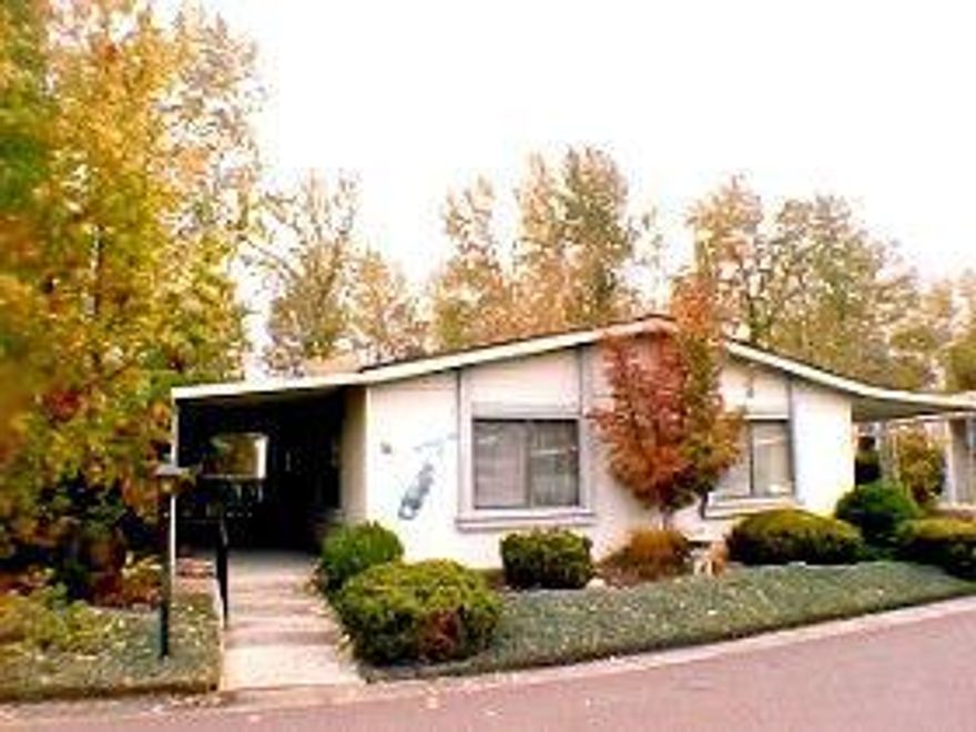 In park, must have current DMV license to show/sell. No showings Fri. night or Sat! Vaulted ceilings, sheetrock walls, large utility room, real wood cabinets, pull out shelves, skylight, master bath has large tub and separate shower, beautiful backyard fenced with timed sprinklers & drip, backs to Bear Creek, did not flood in 94. Very well cared for.