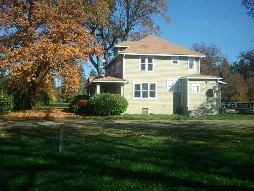 Packed with Possibilities!! 44 M/L acres with Redwood Hwy frontage and charming 1920s Craftsman style, two story farmhouse plus full basement, wood floors, Light and Bright with windows galore, perfect for wine tasting, showroom and or live in. This site is nestled in Beautiful Illinois Valley well known for vineyards and farming!! Most of property is cleared and irrigation comes from 20 Hp 3 phase pump from big pond Asking $469,000 OWC to qualified buyer w/adequate down, Make Offer. Buyer to do own due diligence, all information deemed accurate but subject to change at any time.