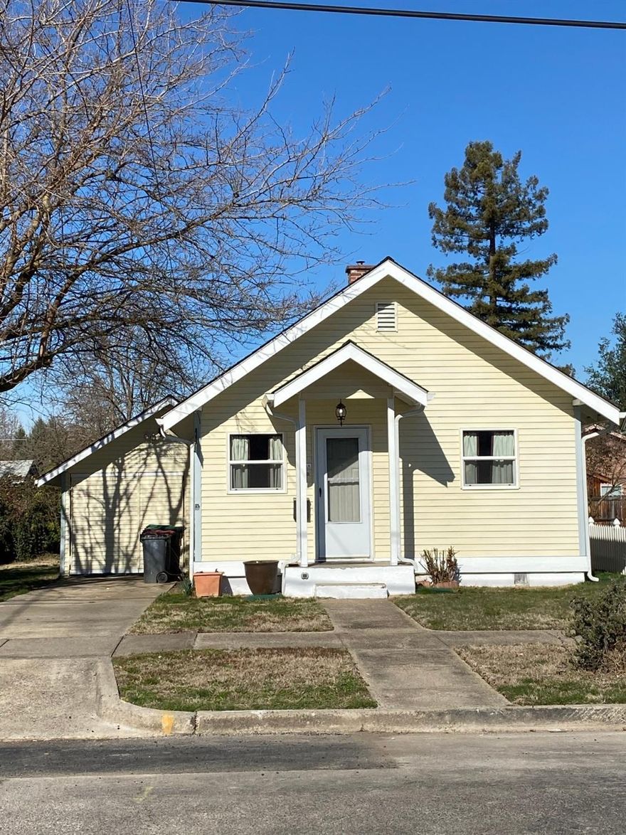 Great buy on a super cute and clean home! 2 bedroom 1 bath move in ready! Nice little quiet street right in town with a park a few lots down and a church across the street. New carpet, new wood laminate flooring and ready for new owners. Roomy kitchen comes with a range/oven, dishwasher and fridge. There's also an extra large bedroom with an area for an office/gaming/nursery/etc. Seller has updated so many items since owning the home. The backyard is great with a little dog run and a gazebo. The gazebo is perfect for entertaining and enjoying the outside year round. Great for first time home buyers, retirees, investors or anyone! Check it out!