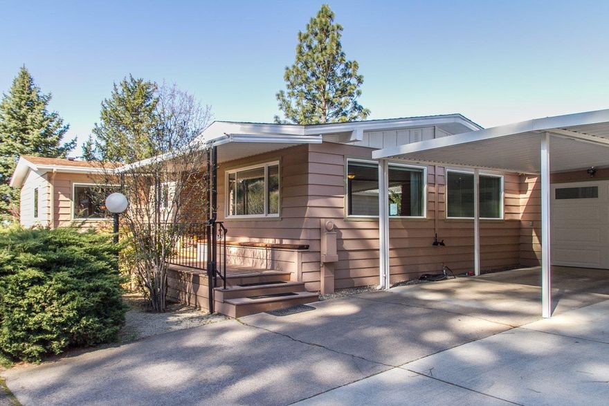 Experience one of the finest homes in desirable Western Carriage Estates. This 2,200 square foot, 2 bedroom, 3 bath home was extensively remodeled in 2012. Spacious living room, family room with natural gas heater stove, separate office. Fantastic island kitchen opens to the dining area. The master suite features a walk-in closet, dual sinks, garden tub and shower. 2 private patios, panoramic views, low maintenance landscaping. Finished single car attached garage, 2 car carport plus additional off street parking. Enjoy the club house, pool and billiard room. Excellent location just minutes to Jacksonville or Medford. Discover this special home today!