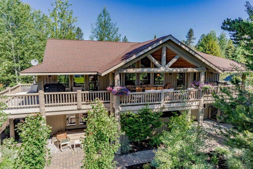 The perfect family retreat. Living spaces face east, with great views of the 9th fairway/lake of Sunriver's Woodlands Golf Course. The home features a spacious great room with a stone fireplace, newly refinished hardwood floors, vaulted ceilings & chef's kitchen. Master suite with a spa/tub & fireplace are on the main floor. Two master bedrooms are down with a bunk room adjacent to the family room. Pool table, & large screen TV are among the amenities of the later. Short walk to the Clubhouse & North Pool.