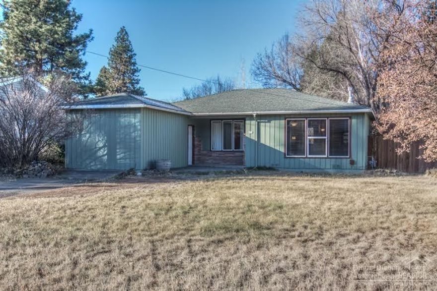 Mid-town charmer in quiet neighborhood and on almost 1/4 acre. Great location...close to Juniper, downtown, and so much more. Original hardwood floors. Large fenced backyard, with mature trees, and ready for pets. Views of Pilot Butte and the 4th of July fireworks. A perfect place to call home.