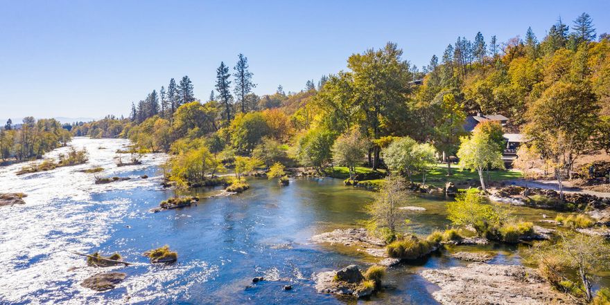 One of The Most Magical Settings You Will Ever Find on the Rogue River & An Incredibly Luxurious Home.  Enjoy Watching Eagles, Osprey, Ducks, Otters, Salmon, Steelhead & More w/Approx. 380' of River Frontage. Very Private.  Main Level Has an Exceptional Kitchen w/Subzero & Wolf Range, Wine Cellar/Butlers Pantry, Grand Vaulted Living Rm, Family Rm w/Wood Burn FP, Master Suite w/Gas FP & Walk in Closet, 2 Bdrms, Full Bath & Laundry.  Upstairs is a Another Master Suite.  Huge 1,479 SF Garage w/Built Ins & Gas Heat.  Ample Storage in Basement.  Significant Improvements;  Added 800 SF of Living Space Including Main Level Master Suite, Added a 4th Bdrm, Major Renovation of Upstairs Master Suite, Added Exterior Staircase & Decking from LR, 4 Zone HVAC, Two FP, Landscaping, Fenced Garden, Patio, Paving & More.  Meticulously Maintained, Exceptional in Every Way. Less Than 30 mins. from Medford & the Airport. This Once in a Lifetime Opportunity Awaits You.  Please No Drive By, Appointment Only.