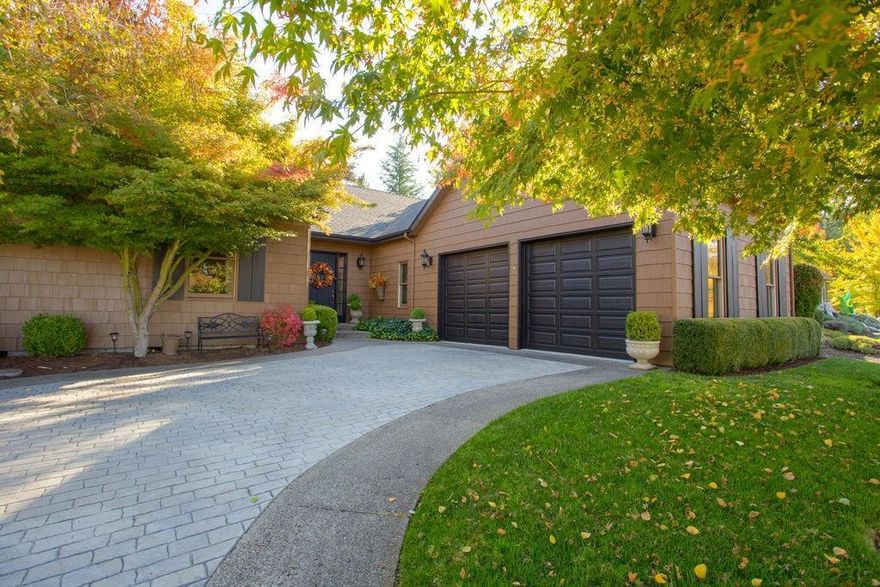 A special home!! This 3 bedroom 2.5 bath is a custom built gem. Single story, over 2,550 sq. ft. with pine wood floors, tile throughout, wood windows, vaulted ceilings, 8 ft doorways, walk-in pantry, large master bath with walk-in shower, soaking tub, and much more. Beautifully landscaped front and back, private back coverd patio with french doors from dining, living and master, over sized two car finished garage, and driveway with stamped concrete. Located in a desirable neighborhood - East Medford . Immaculate condition like brand new! So many custom upgrades.