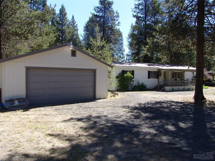 Easy To Show, Very Clean and well maintained 2 bedroom, 2 bath, Manufactured Home on 1.54 acres with detached 2 car garage, Covered RV Structure with lockable storage room. This Home sits on a beautiful corner lot and just minutes from to Lakes, Rivers, Parks and Shopping that La Pine, Sunriver, Bend and Central Oregon have to offer. Also just a short distance to Mt. Bachelor and Crater Lake. Come see this Charming Home Today.