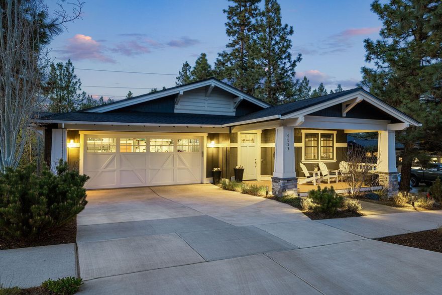 This stunning 4-bedroom, 3.5-bath home with dedicated office space, is located in the coveted Northwest Crossing neighborhood. This residence blends luxury and modern comfort with high-end finishes. The open-concept gourmet kitchen and sleek designer bathrooms showcase meticulous attention to detail, while expansive windows flood the home with natural light, highlighting the thoughtful layout and stylish design. The spa-like primary suite features a beautifully appointed bathroom with heated flooring for year-round comfort. Second primary/guest bedroom downstairs with en-suite bathroom. Exceptional garage storage includes wall-mounted ski, bike and paddleboard racks, built-in cabinetry, and waterproof flooring. The spacious backyard invites both relaxation and play, ideal for summer gatherings or quiet evenings under the stars. Steps from top-rated schools, local restaurants, parks, and downtown Bend, this home offers an unbeatable blend of convenience, lifestyle, and elegance.