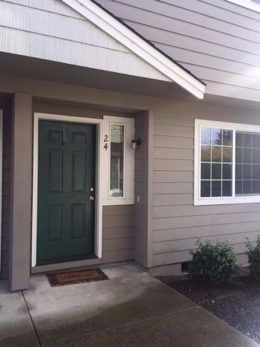 Affordable East Medford townhouse looking for a new owner.. Very well cared for and clean.. The only carpet is on the stairs.. 2 bedrooms and 1 full bath upstairs. Kitchen , dining and living room and bath on main level. Ample storage and laundry room too.. Small fenced patio area and next to a large grassy area. The HOA covers all water, sewer, trash and basic cable. (110.00 per month)