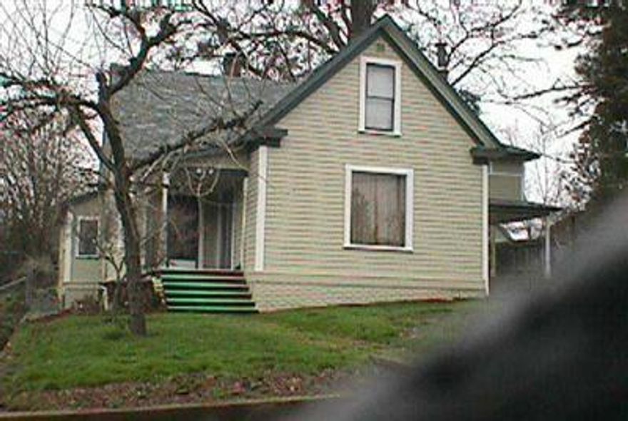 Charming Vintage Home In Nw Grants Pass. 2-car Garage Plus Carport. Lots Of Sf. Area Of Updated Homes With Old World Charm. Landscaping And Paint Recently Completed.