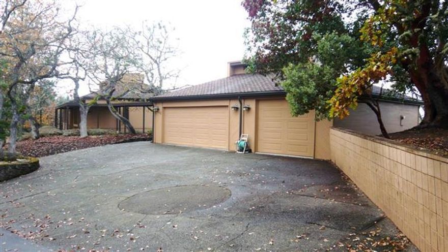 The view from Mt. Olympus couldn't be any better! This executive home sits on a little over 5 acres near the top of Pioneer hill.