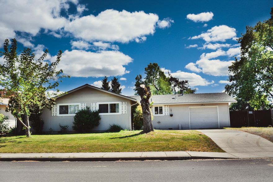 Do not miss out on this clean home with many recent updates.  This home has 3 good size bedrooms and 1 1/2 baths on a large lot with a garden area and RV Parking area.  The home has updated bathrooms, new laminate flooring in the Kitchen, Eating area and the Primary bedroom.  There is also new carpet throughout the rest of the home.  New Gas furnace and air conditioning unit about a year ago and updated Vinyl windows.  The Floor plan is laid out very well and really takes advantage of the square footage.