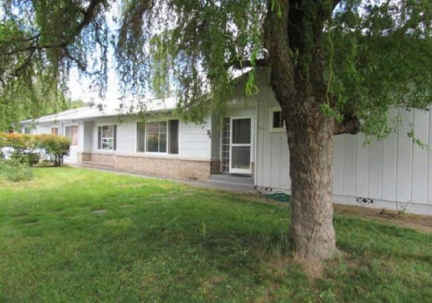 This adorable, 4 bed, 2 bath, single story home is on over 1/2 Acre Lot! Freshly redone inside and out, paint, carpet, flooring, all NEW! This home is also  potentially a two family setup. It also has a VERY LARGE GREATROOM that would be perfect for a Daycare or a Homeschool. This Ranch style home is located in a nice, quite, clean neighborhood. 
It's handicap friendly and has lots of other features such as a Lg. Living room, Attic Fan, Ceiling Fans, Double Paned Windows, a Wood Stove, and lots of windows for
natural lighting. Outside you will find features like; a Barn for a horse or two, a Circle Driveway, Garden, Great Shade Trees located around the yard to keep you
nice and cool during those hot summer days.