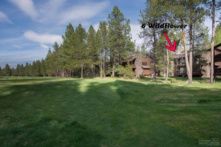 Rustic charm in the multi-level condominium with a fantastic location near the Sunriver Village, Lodge, and the SHARC! Located along the tee boxes of 12th fairway of the Meadows Golf Course, this two bedroom and a 2 bath unit offers a reverse living floor plan and golf view. Lava Rock wood burning fireplace in the Master Suite & living room makes for cozy winter evenings. Relax in the sunshine on the private roof top deck. Let your Sunriver adventure begin!