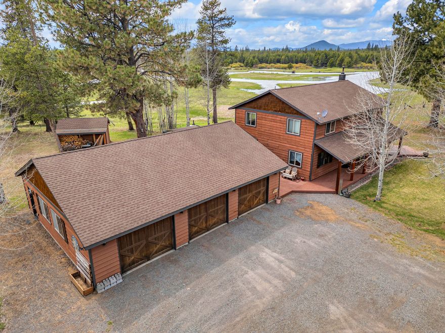 Come make this amazing 4 bedroom / 2.5 bathroom home on 9.66 acres your next adventure!  This home features a warm and inviting vibe with a wood fireplace, custom dog kennel under the stairs and 3 door 1,500 sq. ft. attached garage that provides the perfect storage space for your outdoor toys! This home also has a green house and several storage buildings separate from the main home. Located in the heart of Central Oregon, this exceptional home offers the perfect balance of privacy, natural beauty, and access to outdoor adventure. Backed by (BLM) land, the property provides an unmatched sense of space and seclusion, with no neighboring development behind — just amazing panoramic views of Mt Bachelor and the Little Deschutes River with native flora and wildlife. Whether you're seeking a tranquil retreat or an active lifestyle immersed in nature, this home delivers on every level.  This property would qualify for a permanent home or a vacation rental.