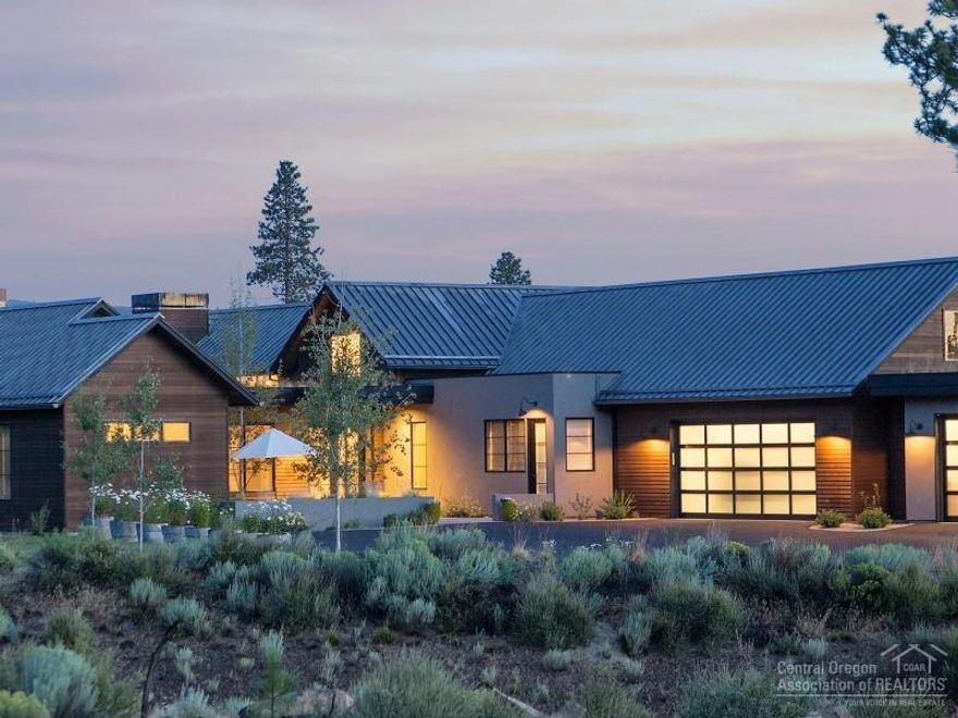 A one of a kind high desert modern estate in the heart of Tetherow golf course. This home features a light & bright open, flexible floor plan featuring a large chef's kitchen with butler's pantry, 4 spacious bedrooms, 4 1/2 baths, large vaulted great room plus 2 bonus rooms & a loft. Outside, enjoy a beautiful front courtyard and a large entertaining back patio with an outdoor fireplace & a spacious yard with golf course views on three sides. This home & location provide the best of the best in Bend living.