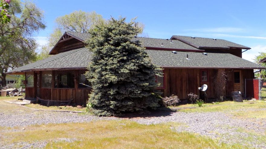 Enjoy the peaceful pastoral views from this newly updated Country Classic! Most of this home has new interior paint, floor coverings, doors, etc. The kitchen has all new cabinetry and new appliances. Seller had upstairs bedroom for the master, but there is also a bedroom with bath on main level that could be a nice master. Large detached double car garage. Fenced pasture area with animal shelter and numerous other out-buildings.