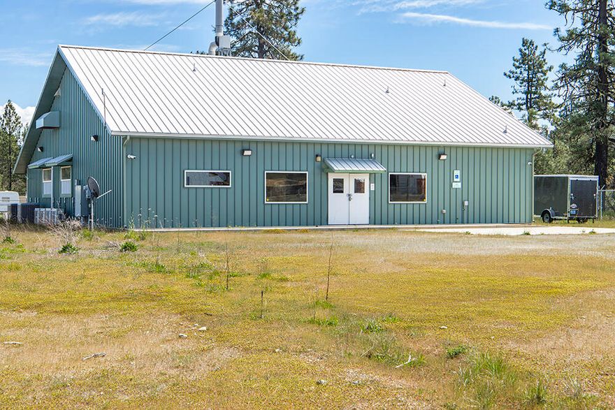 Exceptional chance to own this 3060 sq ft commercial building! Set on a securely fenced 1.38-acre lot zoned Rural Industrial, the property offers versatility for various businesses, including a professional lab setup. Built in 2019, it features private office space, ADA-compliant amenities, 3-phase power, backup diesel generator, specialized facilities like flammable chemical storage rooms, state-of-the-art HVAC, and compliant lab environment. Owner financing possible. Lab equipment and personal property for sale separately. Don't miss this chance to establish or expand your business in this strategically located, meticulously designed space!