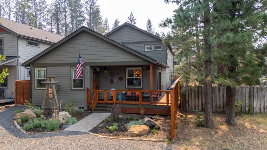 PRICE IMPROVEMENT! Welcome To This Quality Built Custom Home That Includes Its Own Attached ADU with Full Living Accommodations. The main level features a Primary Bedroom & suite with an additional second bedroom and a full bathroom, full laundry room, dining area and a family room with a stone gas fireplace. The kitchen was tastefully designed to accompany large groups & offers a large Quartz island and sitting area, Quartz countertops and a generous amount of room to entertain family and friends throughout the year. Off the kitchen you will encounter your own spacious and private covered patio with plenty of room to extend your friends & family during Holidays and family gatherings.  The upper level offers a full size bathroom, bedroom and a large bonus room for hobbies or entertaining and has access to its own private deck.  The ADU has its own private access off the end of the home and shares the driveway.  The wall between the upper bonus room & ADU has added sound proof material