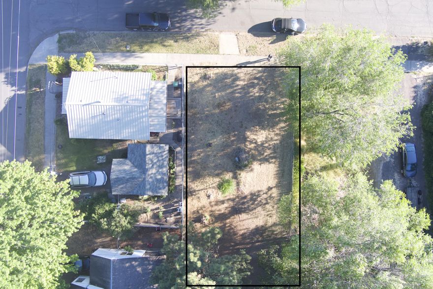 This 6098 sqft lot has city water, power and sewer connected. Used to have a motor home on it. Lot is cleared every year. Zoned Medium Density Residential. So you can build single-family and duplex residences. Great for income producing units. Centrally located in Klamath Falls, located close to shopping and transportation for convenience. Owner will finance. No scheduling required. Go view property at your own convenience. Give us a call now.