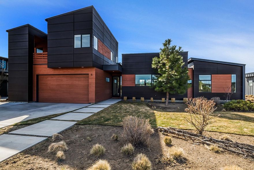 Custom built by Timberline Construction and designed by Lightfoot A+D, this home features stunning vista views that bring the outdoors in. This home offers a gracious great room floor plan that is comfortable & cozy, yet perfect for entertaining. With a master bedroom on the main level & two guest rooms upstairs, it is perfect for the full time residence or vacation home, ideally situated in the exceptional community of Tetherow where golf, amenities, Mt Bachelor, bike trails & downtown Bend all easily accessible.