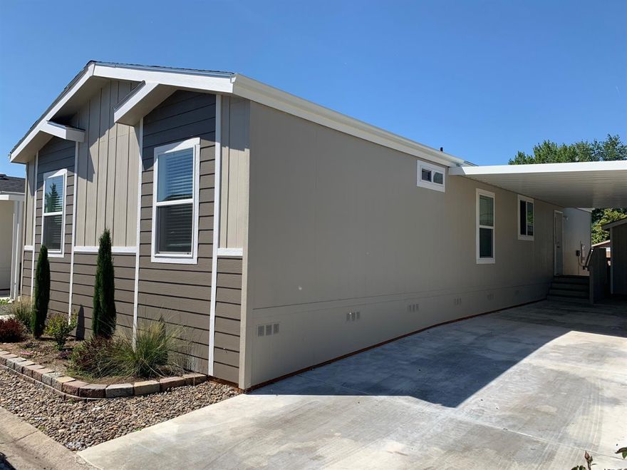Brand New Champion Built Manufactured Home that is simply amazing inside with a wide open split floor plan. The kitchen has all new Whirlpool stainless appliances and refrigerator. There is plenty of storage with a kitchen island looking into the family and formal dining area. The large master bedroom has two walk-in closet areas and an extra large master bathroom with double sinks and extra room. Three newly carpeted bedrooms are together near a full size and very nicely designed bathroom. This home is ready for the Family needing a new and nice 4 bedroom setup. Call to see this one today! Activities/Amenities Included: Swimming pool, Indoor Spa, Playground, Fitness Center, Basketball Court, Library, Clubhouse, Billiards, Laundry Facilities,Tennis Court, Saunas.