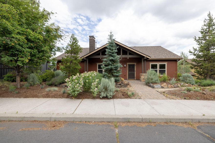 Located in the desirable Sagewood neighborhood on Bend's west side, this 2003-built 3 bed, 2.5 bath, 2,036 sq ft home offers easy access to Mt. Bachelor, Cascade Lakes Hwy, and downtown. Enjoy single-level living with vaulted ceilings, a spacious great room floor plan, and a large primary suite separated from the guest bedrooms. The kitchen features a center island, walk-in pantry, and newer appliances, with direct access to the deck—ideal for entertaining. The lower level includes an office/bonus room, laundry with half bath, and a generous mudroom/flex space off the alley-load oversized 2-car garage with built-ins, under-stairs and crawl space storage. Relax on the front paver patio with your morning coffee. Xeriscape yard for low maintenance, with space to add a side yard fence. Recent upgrades include a PV solar system, new exterior paint (2022), new roof and HVAC (2024), and new water heater 2024.