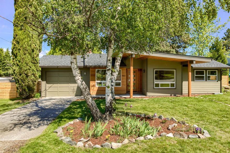 Stunning, Single Level Home in a great location! This mid century home was extensively renovated & will please the most discriminating buyers. Sleek & sophisticated, you are sure to appreciate the tasteful use of stone & wood. Gleaming hardwood floors, gorgeous wooden doors, great natural light. Versatile floorplan w/ living and family rooms. Each featuring a fireplace w/ custom mantles utilizing 150 yr old beams. 2 guest bedrooms & bathroom are nicely separated from the master. Beautifully tiled bathrooms w/ custom vanities. The kitchen is open & has gorgeous painted cabinets, butcher block breakfast bar & granite countertops*. The Master Suite is located toward the back of the house. It features a walk-in closet, private bath with dual vanities & oversized 2 headed shower & tile surround. Located on a .25 Ac TID irrigated flat lot w/ lots of room for gardening, pets, kiddos, etc. Single car garage & potential for an aux dwelling (buyer to do own due diligence)