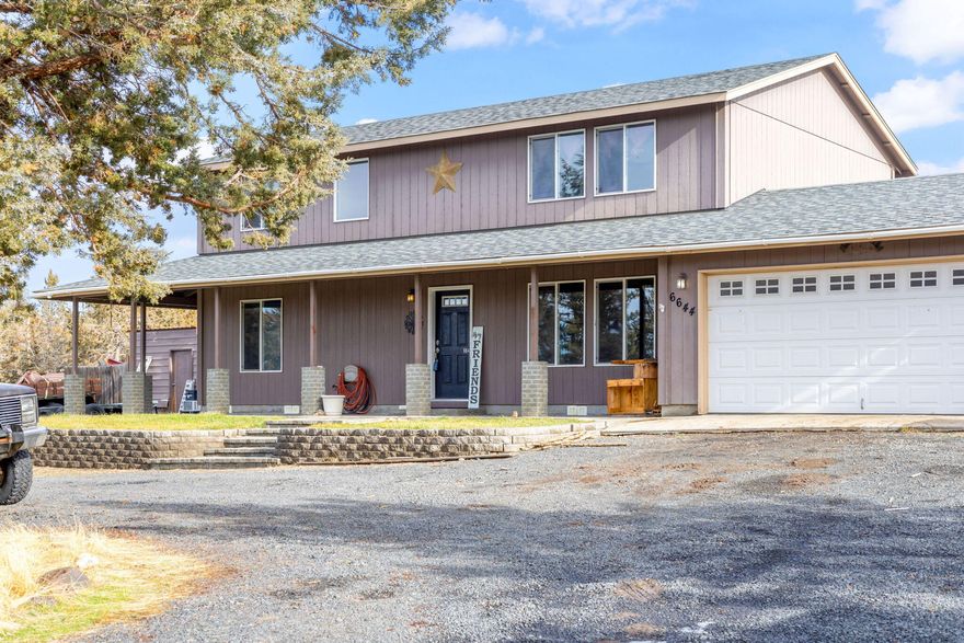 Seller offering $10,000 towards buyer's closing costs and prepaid items! Welcome to your dream home on 2.23 acres of blissful tranquility! Nestled off Lower Davis Loop, this home offers a perfect blend of spacious living, thoughtful design and the charm of rural living. This stunning estate has so much to offer: enjoy the luxury of space with 5 generously sized bedrooms and 3 well appointed bathrooms. Indulge in the ultimate retreat with not one but 2 primary suites. The first is conveniently located on the main floor, offering easy accessibility. The second primary suite upstairs provides a private haven for relaxation. 3 more oversized bedrooms, one featuring adorable built in bunk beds, combine functionality with a playful touch. The fenced and cross-fenced acreage ensures privacy and security while providing the ideal backdrop for outdoor activities, gardening, or simply enjoying your own chicken coop.