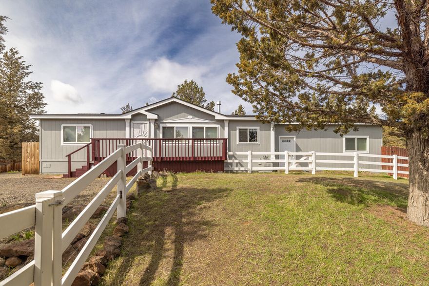 Must See! Beautiful very upgraded manufactured home. Everything has been recently upgraded including counter tops, cabinets, light fixtures, toilets, showers ect. the list goes on and on. Home features beautiful granite complimented by laminate wood flooring. Extra rec room added to the house makes for extra space for everything or storage. Newly painted exterior. This home is a great place to enjoy company and the great outdoors; truly is a must see!!