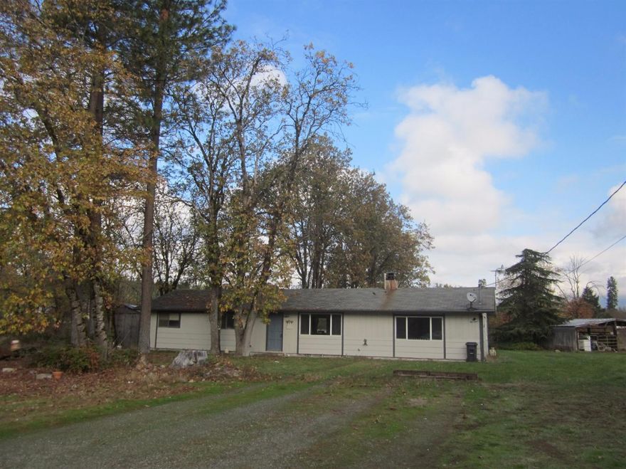 Very nice & affordable country living, close to the town of Merlin & the great Rogue River. The 3 bedroom, 2 bath, single story 1584 sq ft home is peaceful & private & located on over an acre of usable land. Home sits off Pleasant Valley Rd & is surrounded by mature trees. Super strong well for watering your garden or whatever you decide to grow.