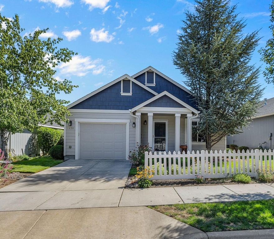 Welcome to Summer Creek, a sought-after 55+ community! This charming starter or retirement home features an inviting open floorplan with soaring ceilings that fill the space with natural light. One bedroom plus den/office. Enjoy easy indoor-outdoor living with a deck accessed off both the great room and primary suite. The extended single-car garage provides extra storage or workspace and includes metal shelving and storage cabinets, providing plenty of room to keep everything organized. The   landscaped yard adds curb appeal with low-maintenance beauty. Residents also enjoy access to a community clubhouse, complete with a full kitchen and bathrooms—perfect for gatherings and events. A comfortable and convenient home in a welcoming neighborhood—don't miss this one!