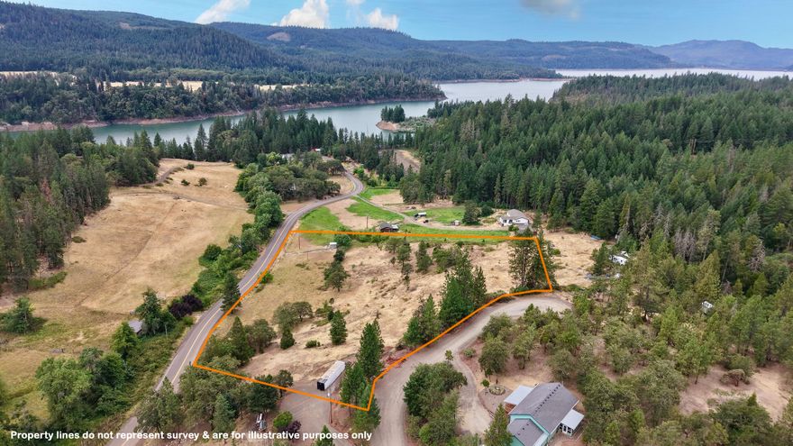 Beautiful 5-acre building lot near Lost Creek Lake with breathtaking mountain views. Zoned RR-5 and ready for your dream home—manufactured homes are allowed. Power is located at the property line, and an older septic approval is on file. The property is connected to a community water system for domestic use and also includes water rights from a nearby spring for irrigation. A gated driveway provides access to an existing RV site, offering a great setup while you build. This lot offers a rare combination of utilities, natural beauty, and usability. Located in a desirable rural area just minutes from Lost Creek Lake, the Rogue River, and year-round outdoor recreation including boating, fishing, and hiking. Enjoy the peace and privacy of country living without being too far from town. Whether you're searching to build a full-time residence or a weekend getaway, this property offers exceptional value and flexibility in one of Southern Oregon's most scenic locations.