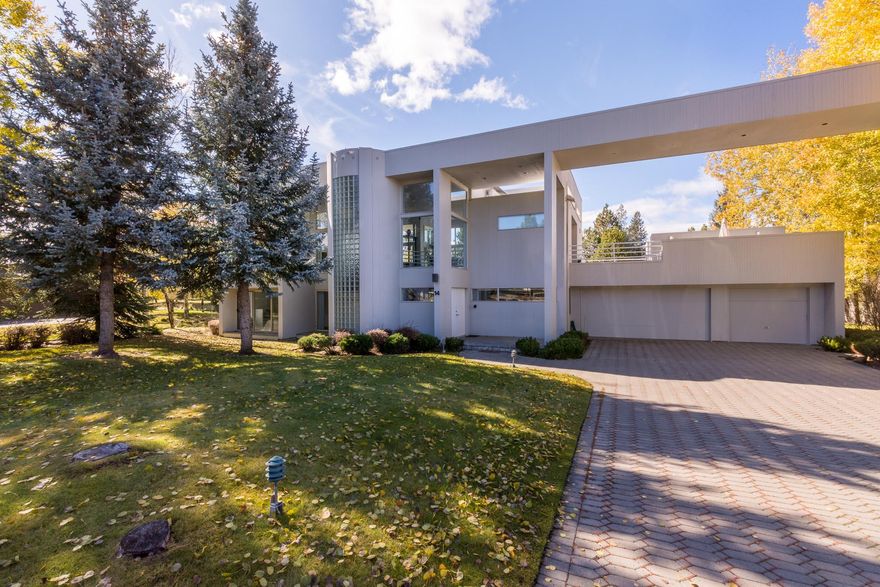 Gorgeous golf course views and clean contemporary style are all yours in Sunriver! Walls of huge windows let in amazing natural light and soaring ceilings let the open layout feel even more expansive. Marble tile greets you at the entry and leads you upstairs to that expansive great room, dining area and large kitchen all with amazing views! The huge upper deck looks out to the golf course, offering an enclosed hot tub and amazing space to relax and enjoy the Sunriver outdoor lifestyle! The ground level is comprised of a garage-to-bonus room conversion; the spacious primary bedroom suite offers a marble tiled bath and private deck access; 2 guest bedrooms share a Jack & Jill bath making them Jr suites! 2 Additional bedrooms & full bath on the lower level offer great flexibility for all guest visits! A 3rd full bathroom on the upper main level makes this a perfect resort retreat.  Established rental. SHARC Paid. Imagine... big stylish spaces, THAT view & all yours?!?!