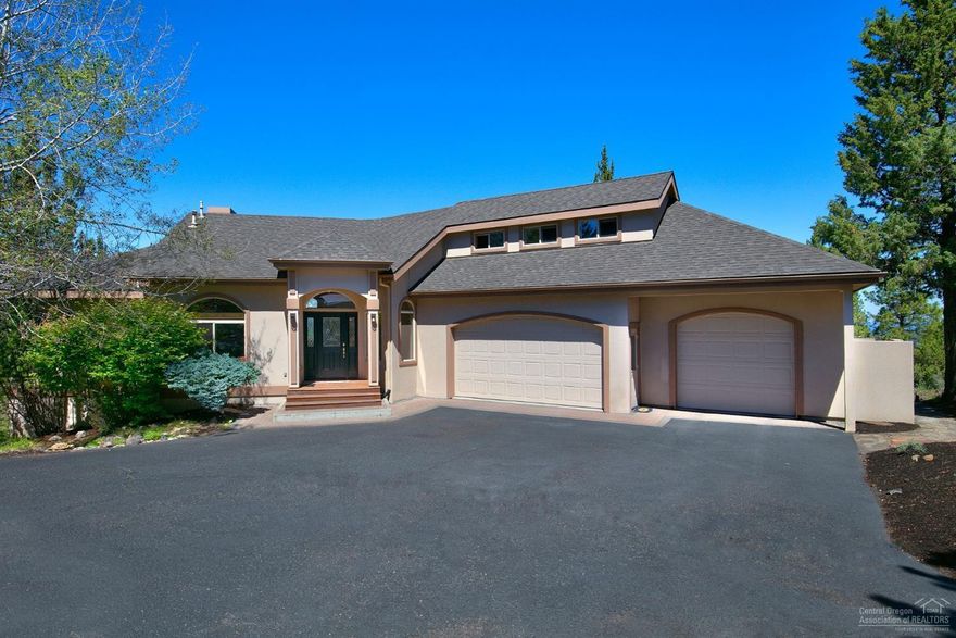 This house truly has one of the best views of the entire Cascades range in Bend, stretching from Mt. Bachelor to Mt. Hood. Breathtaking views from almost all the rooms in the house. A must see, if views are on your checklist. Five Bedrooms, 4042 sq ft, light, bright and space for everyone. Enjoy a flowing floor plan featuring a great room with stunning views, hardwoods, open kitchen and high ceilings. The main floor master bedroom offers views and access to fantastic deck. 4 Bedrooms and a large versatile bonus room with deck occupy the lower level. Media room and office occupy the top level. 3 car garage and tons of storage for all your Central Oregon toys. Beautiful, natural landscape with mature trees and a park like setting. If you desire views, this is your house.