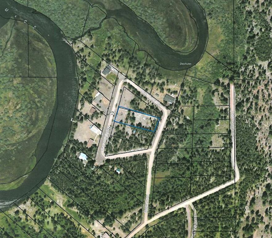 The RV lot is across the street from the Deschutes River and the end of a quiet lane. Site built homes around this lot. This is a must see, if you want your own private lot in Central Oregon. Convenient location between Sunriver and La Pine.